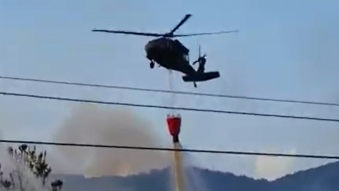 Video: Guardia Nacional  combate fuego forestal en Gurabo via Aerea.